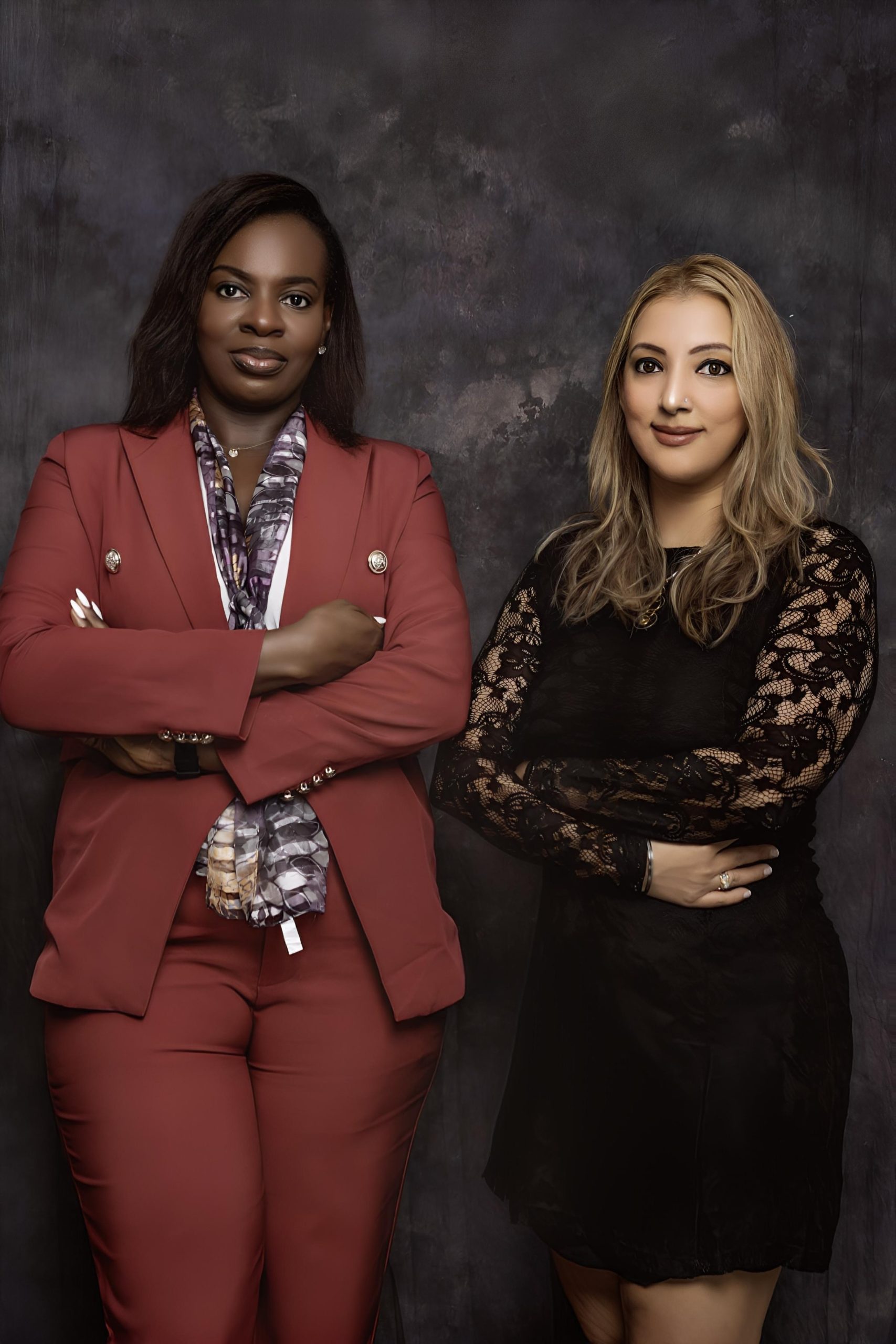 Three African businesswomen collaborating around a table